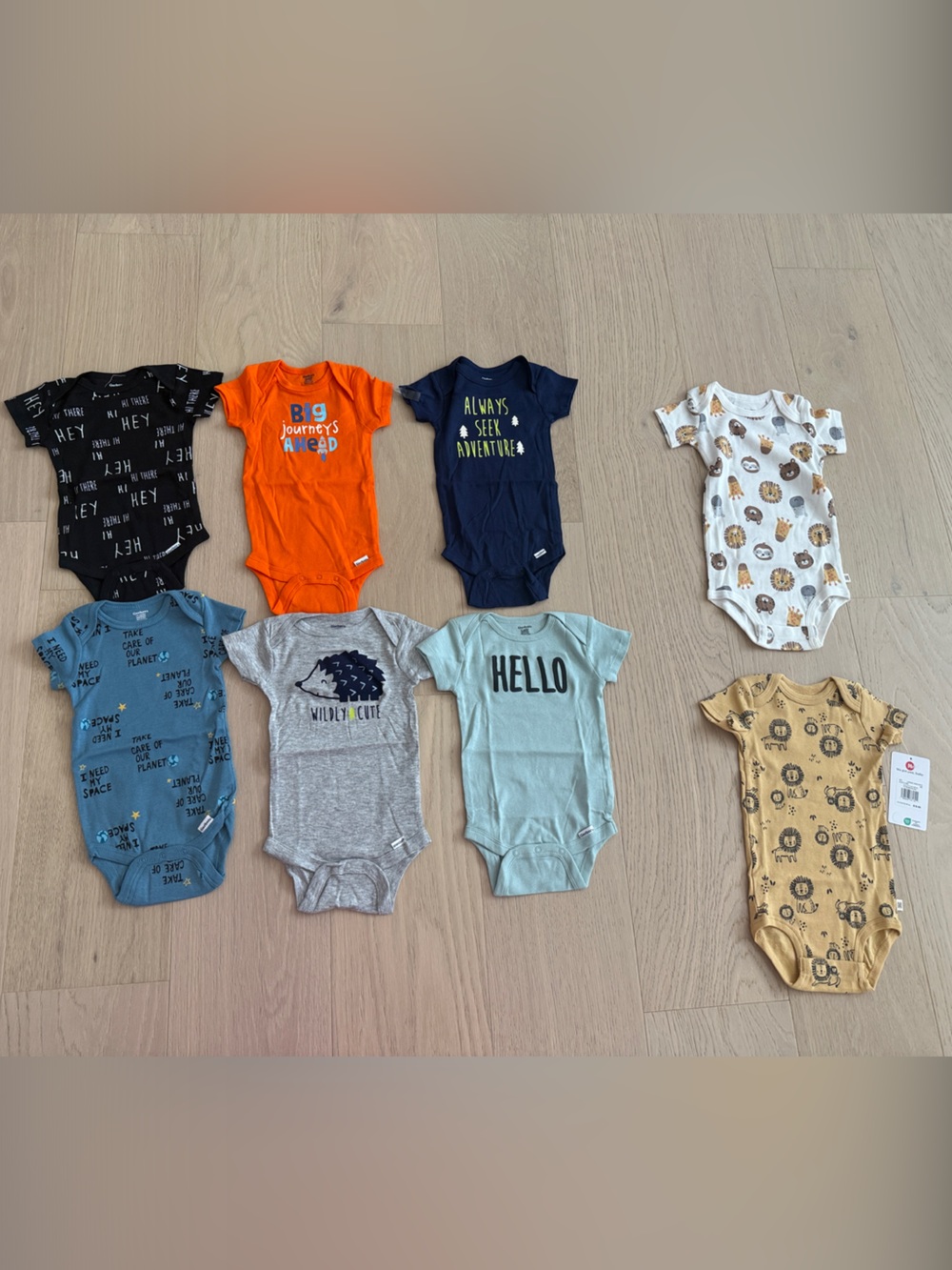 3-6mo + 6mo onesies! Never worn baby boy onesies